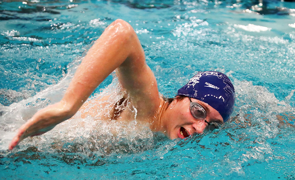 Freshman Davin Glynn competes in the opening session at the Cougar Splash Invitational. Photo by Timothy R. Dougherty / Double Eagle Photography