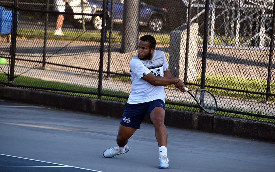 Junior Ronny Pimentel Ferrer gets ready to return the ball in a match versus Muhlenberg College at Hoffman Courts. Photo by Christine Fox