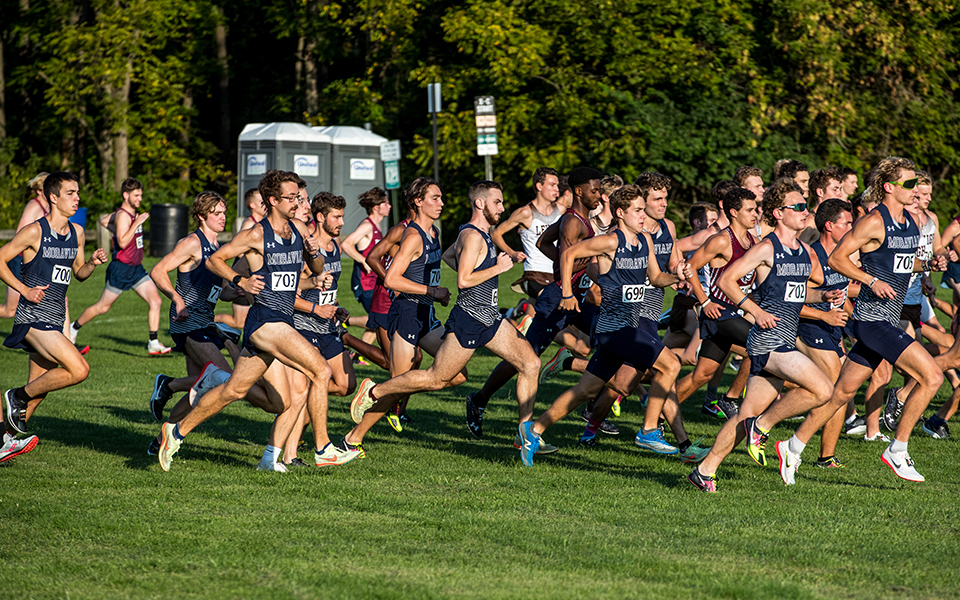The Hounds race as a pack at the start of the 2023 Lehigh University Invitational. Photo by Cosmic Fox Media / Matthew Levine '11