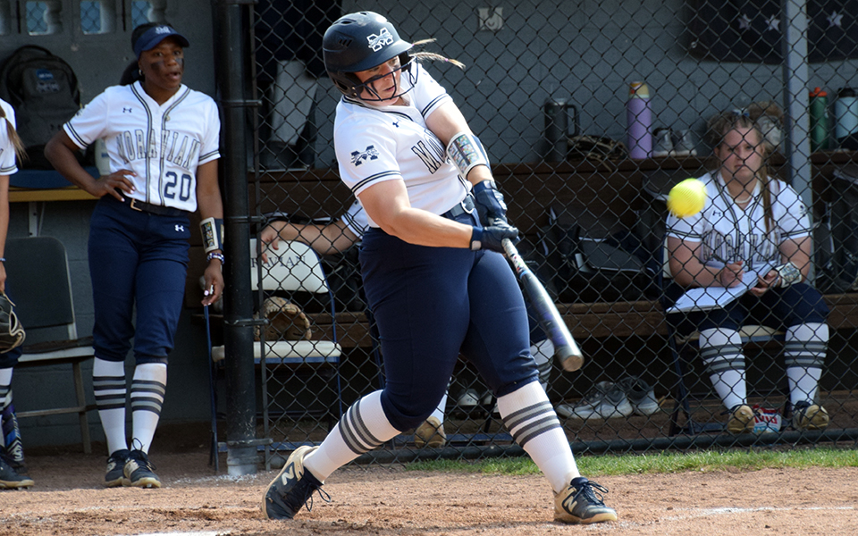 Sophomore catcher Marcie Silberman connects on a first inning home run versus Arcadia University at Blue & Grey Field. Photo by Anika Buzzy '25