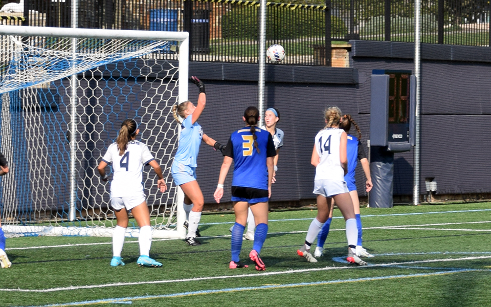 Goalie Paige Harrison gets ready to knock a ball over the net in a match versus nationally-ranked Misericordia University on John Makuvek Field during the 2022 season. Photo by Alex Dillon '26