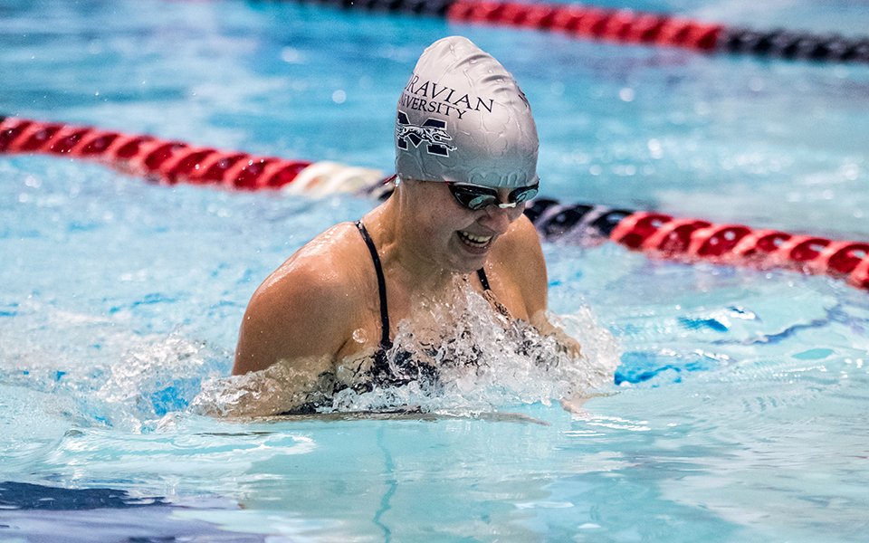 Junior Sarah Mazzetti competes in the individual medley in a double dual meet during the 2022-23 season at Liberty High School's Memorial Pool. Photo by Cosmic Fox Media / Matthew Levine '11