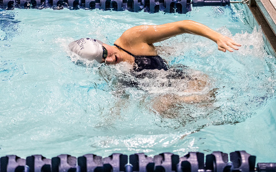 Junior Sarah Mazzetti makes the turn during the individual medley in a double dual meet at Liberty High School's Memorial Pool during the 2022-23 season. Photo by Cosmic Fox Media / Matthew Levine '11