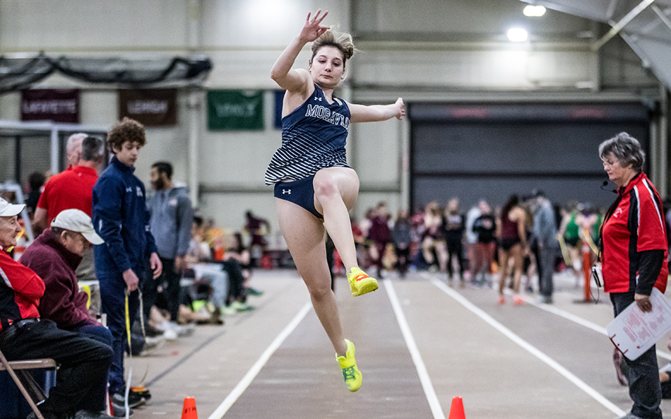 Senior Elizabeth DeMassa competes in the long jump at the Moravian Indoor Meet at Lehigh University's Rauch Fieldhouse earlier this season. Photo by Cosmic Fox Media / Matthew Levine '11