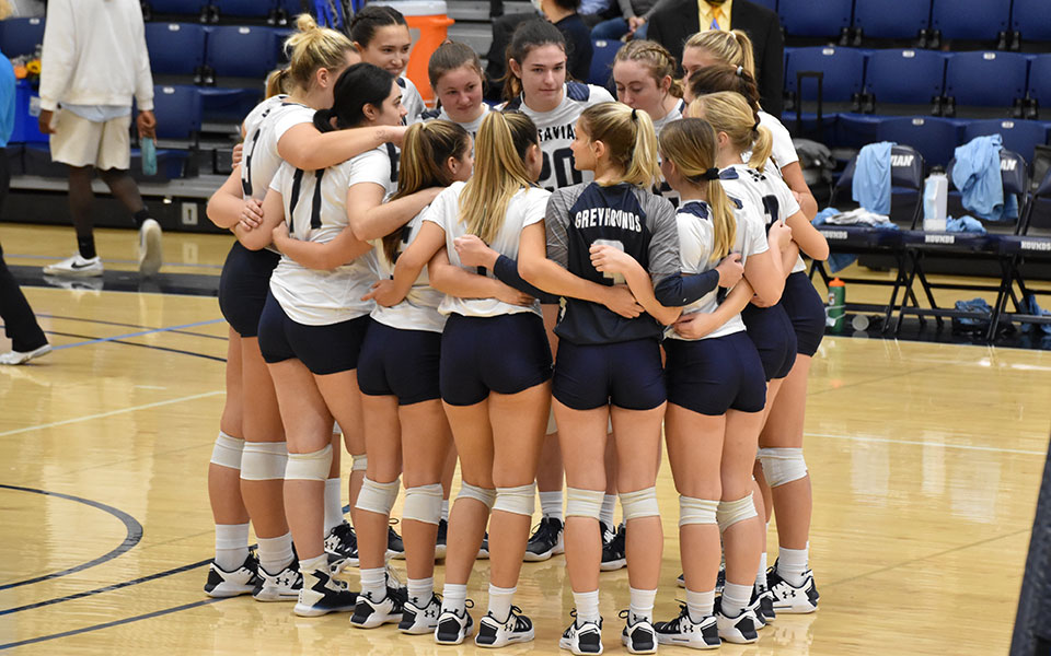 The Greyhounds huddle before their final home match of 2021 versus The University of Scranton in Johnston Hall. Photo by Nadia Hassanali '22.