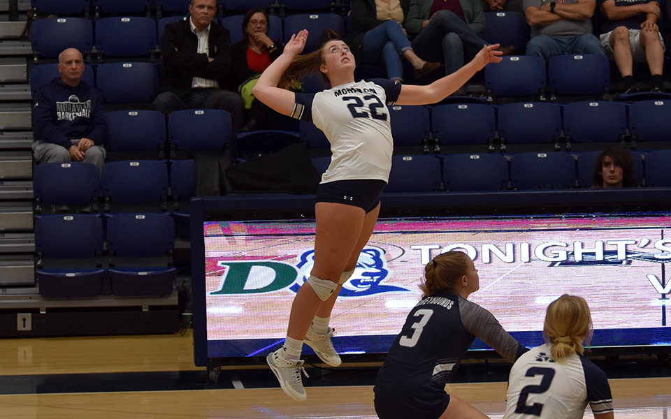 Junior outside hitter Jenna Deegan goes up for an attack attempt versus Drew University in Johnston Hall. Photo by Marissa Williams '26